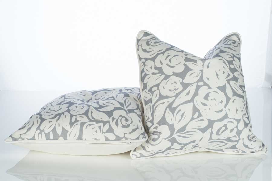 Gray organic cotton "Patsy" throw pillows from Rubie Green add elegance and sophistication to your living room. 18-inch-square pillow: $75